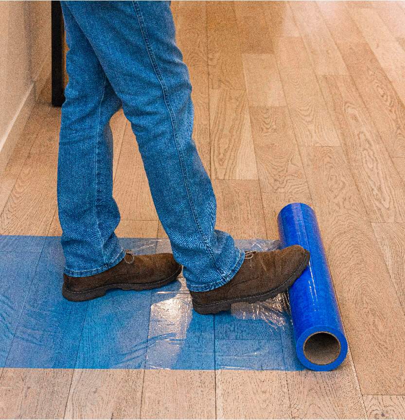Floor protection being installed for winter moving conditions